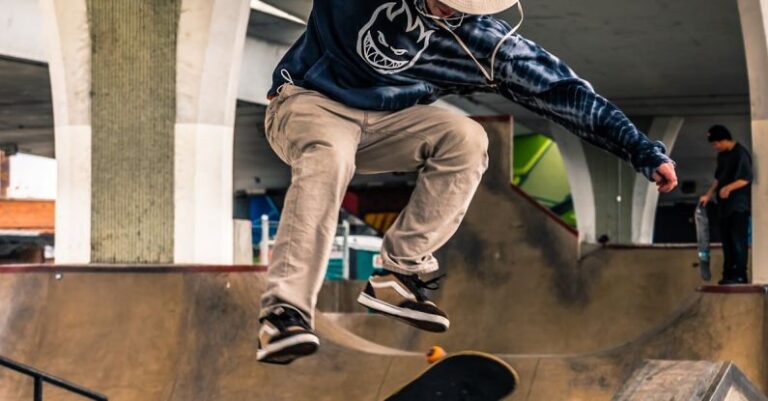 Street Performances - Man on Mid Air Performing Skateboard Trick