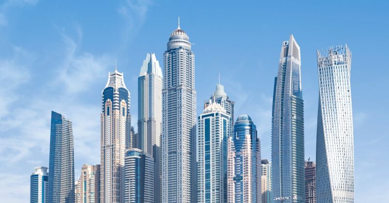 Skyscrapers - Concrete High-rise Buildings Under Blue Sky
