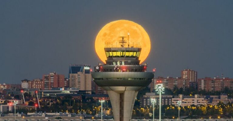 Late-Night Eateries - Full Moon behind Air Traffic Control at Madrid Airport