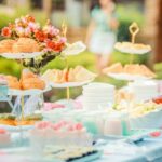 Literary Events - Various Desserts on a Table covered with Baby Blue Cover